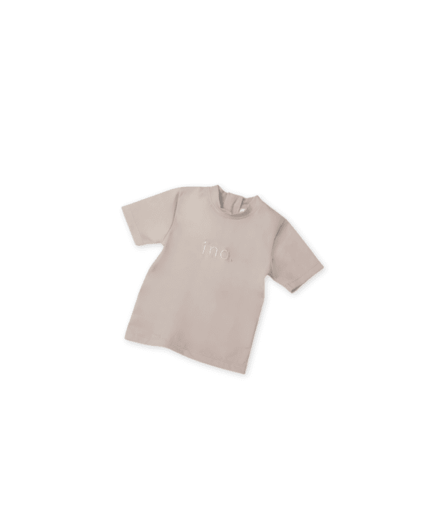An Ina Rash Shirt - Sand Colour dress with the text "fin." at the center on a white background.