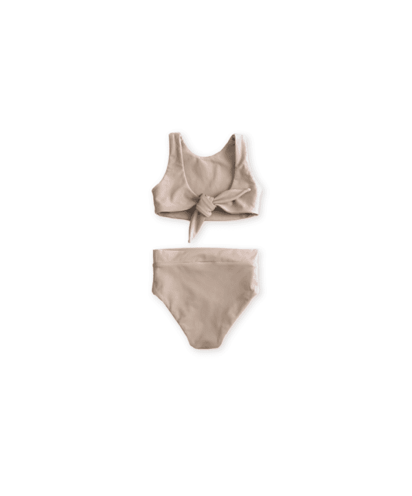 Arla bikini swimsuit with a bow detail on a white background.