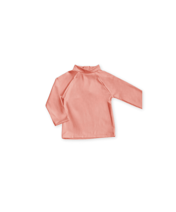 Apricot turtleneck blouse on a white background.