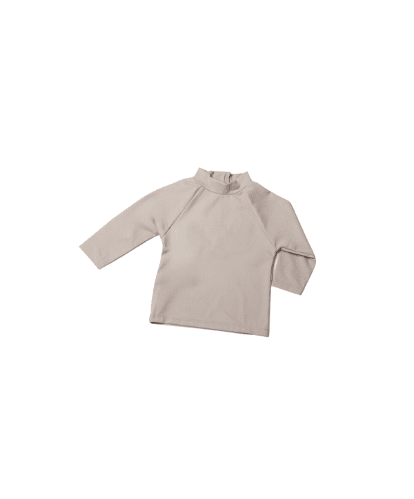 Nella Rash Shirt - Sand Colour laid out flat on a white background.
