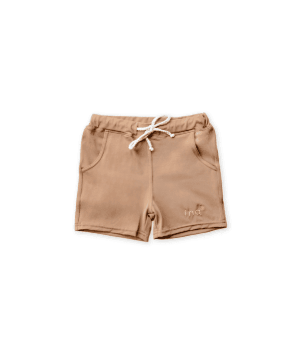 A pair of Warm Pecan Amias Trunks displayed on a white background.