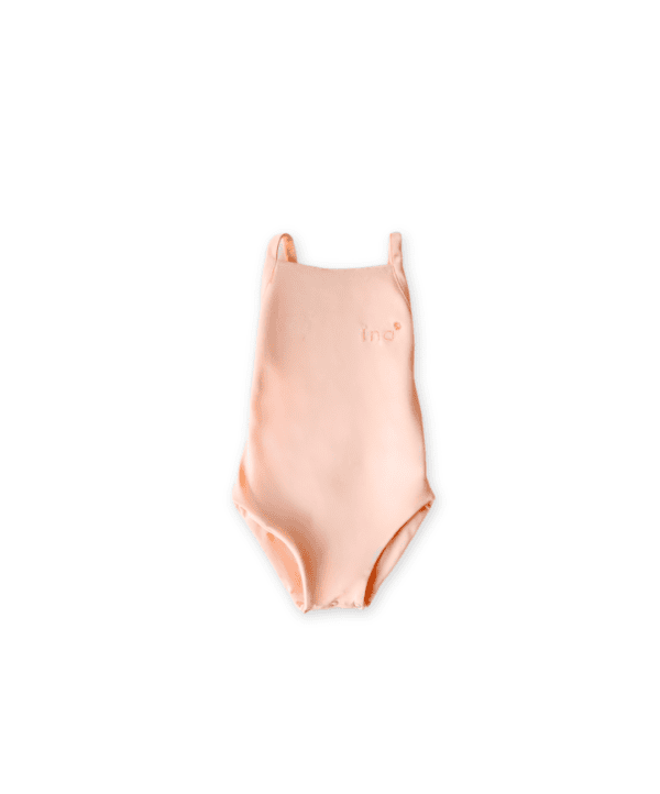 A Mara One-Piece - Peach Blossom laid out flat on a white background.