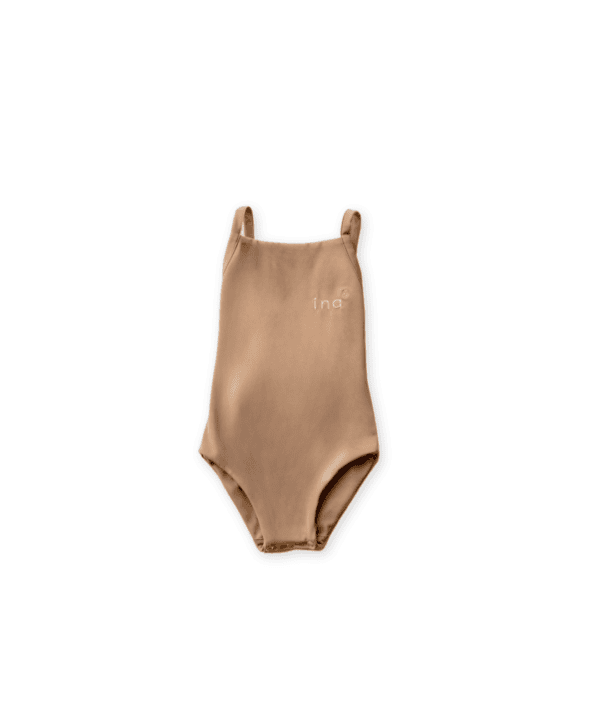 A Mara One-Piece - Warm Pecan swimsuit laid out on a white background.