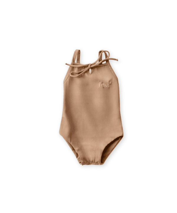 Aurelia One-Piece - Warm Pecan swimsuit with tie shoulders on a white background.