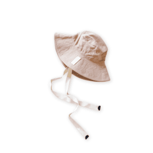 Golden Sun Bucket Hat - Sahara Sand with chin straps on a white background.